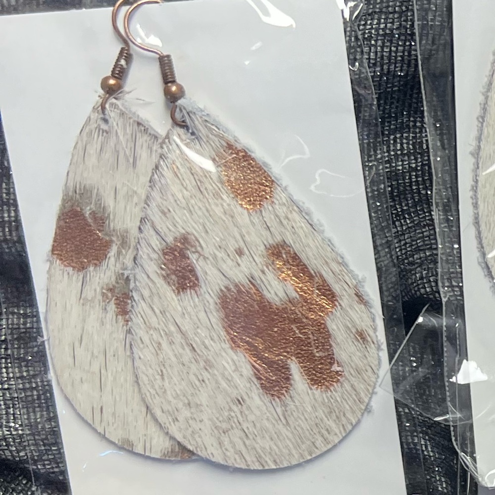Hair on, rawhide, genuine Leather teardrop earrings 1.5” x 2.25” 1 pair for sale